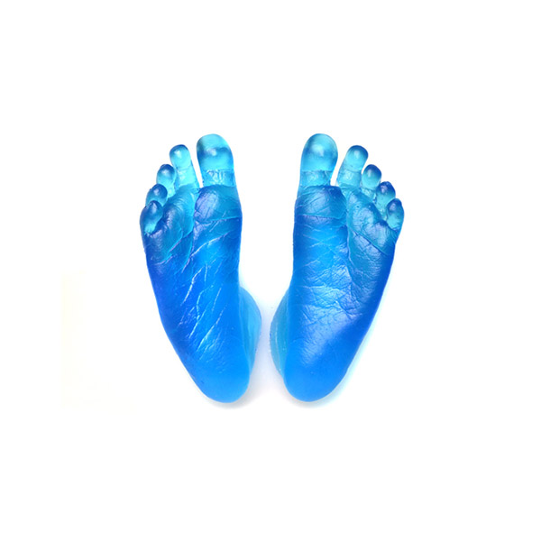 Baby cast feet in blue glass by Philippa Herbert