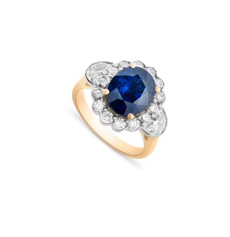 Central Sapphire with half moon diamond bezel
