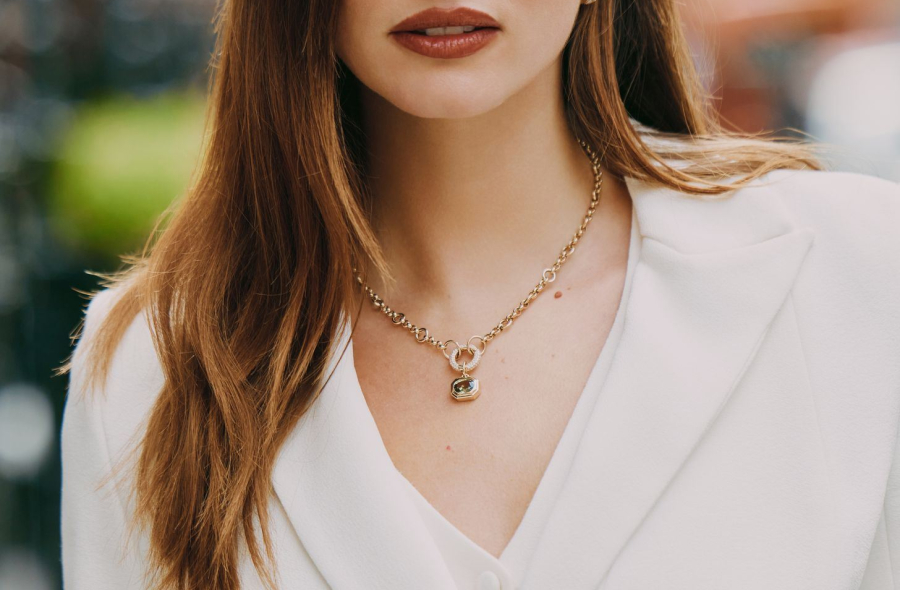 Georgina wears Philippa Herbert with a trouser suit by Suzannah London